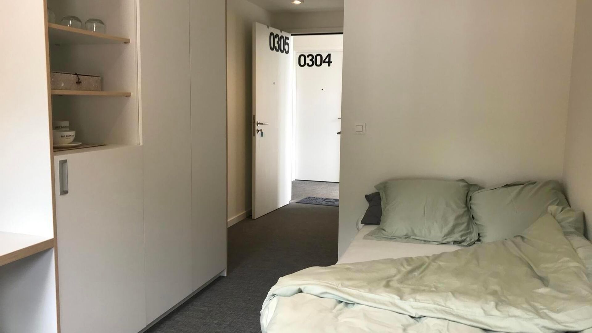 Student rooms located in the ACE student residence at 266 Knight Street. This room has its own bathroom, is furnished with: a bed, desk, bookshelf, closet and refrigerator. Each hallway has its common kitchen, where each student has their own kitchen cabi